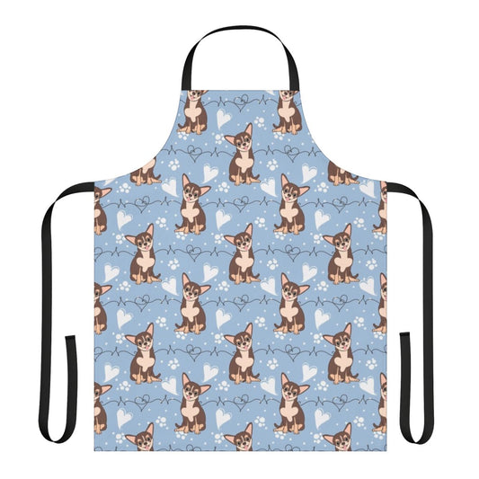 A tri-color chihuahua-themed cooking apron with a cute, cartoon-style print.