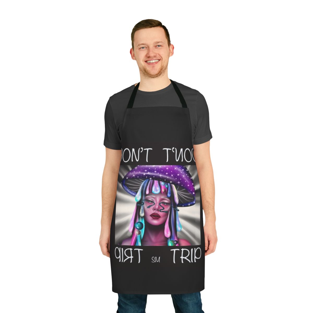 A vibrant, tie-dye apron featuring a trippy, psychedelic mushroom design for the ultimate in groovy, retro style.