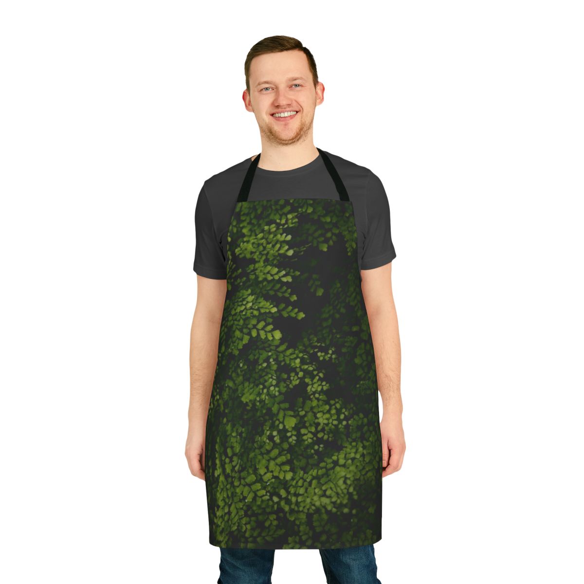 Small green leaves printed on a fabric apron