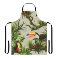 Apron featuring a colorful pattern of toucans and bromeliads against a lush, green background
