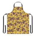 A quirky apron featuring a collage of Nicolas Cage's face on a yellow banana pattern.