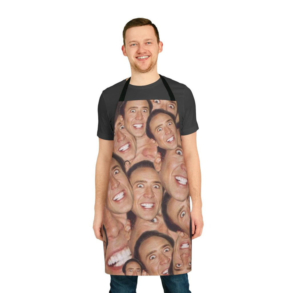 An apron featuring a collage design with the face of actor Nicolas Cage.