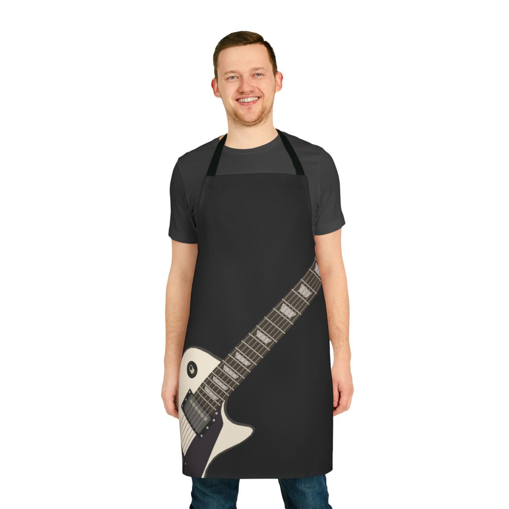 Person wearing a "Ready for Air Guitar" apron while playing an electric guitar