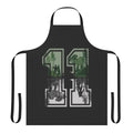 Eleven from Stranger Things wearing a retro-style apron with the series logo