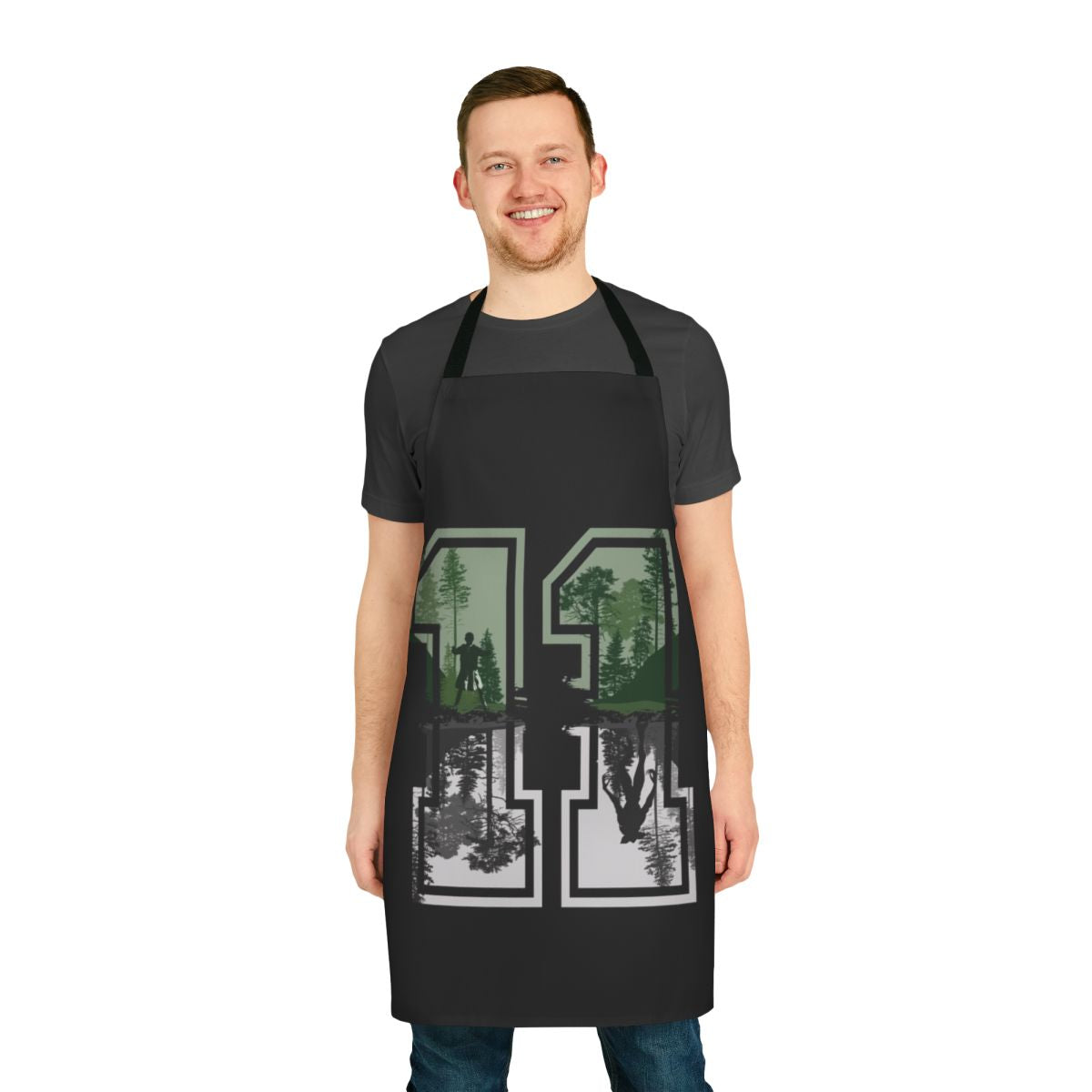 Eleven from Stranger Things wearing a retro-style apron with the series logo