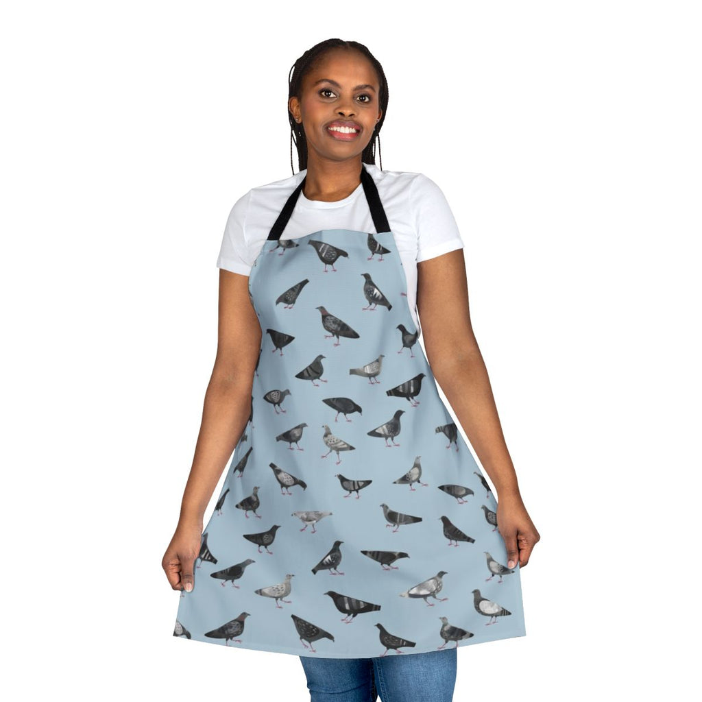 An apron featuring a pattern of grey pigeons or doves in an urban setting.