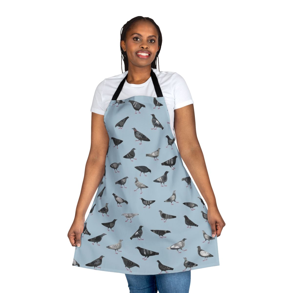 An apron featuring a pattern of grey pigeons or doves in an urban setting.