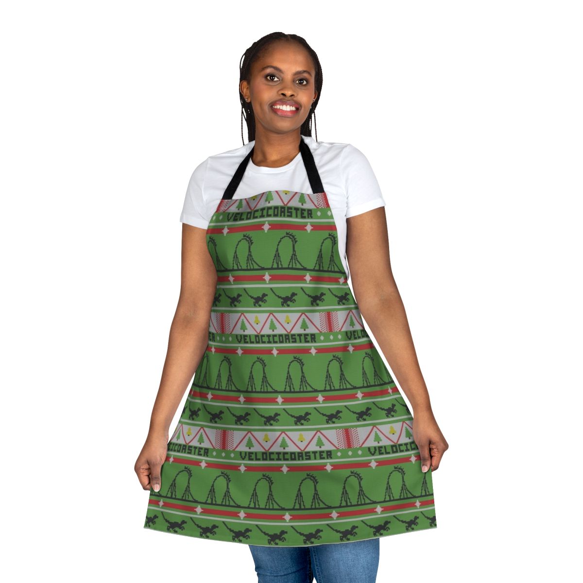 A festive apron featuring a dinosaur theme park-inspired ugly Christmas sweater design