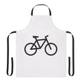 Person wearing a bicycle-printed apron while cycling