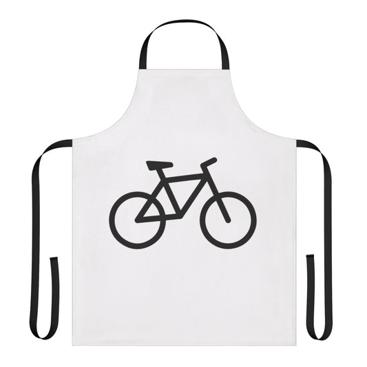Person wearing a bicycle-printed apron while cycling