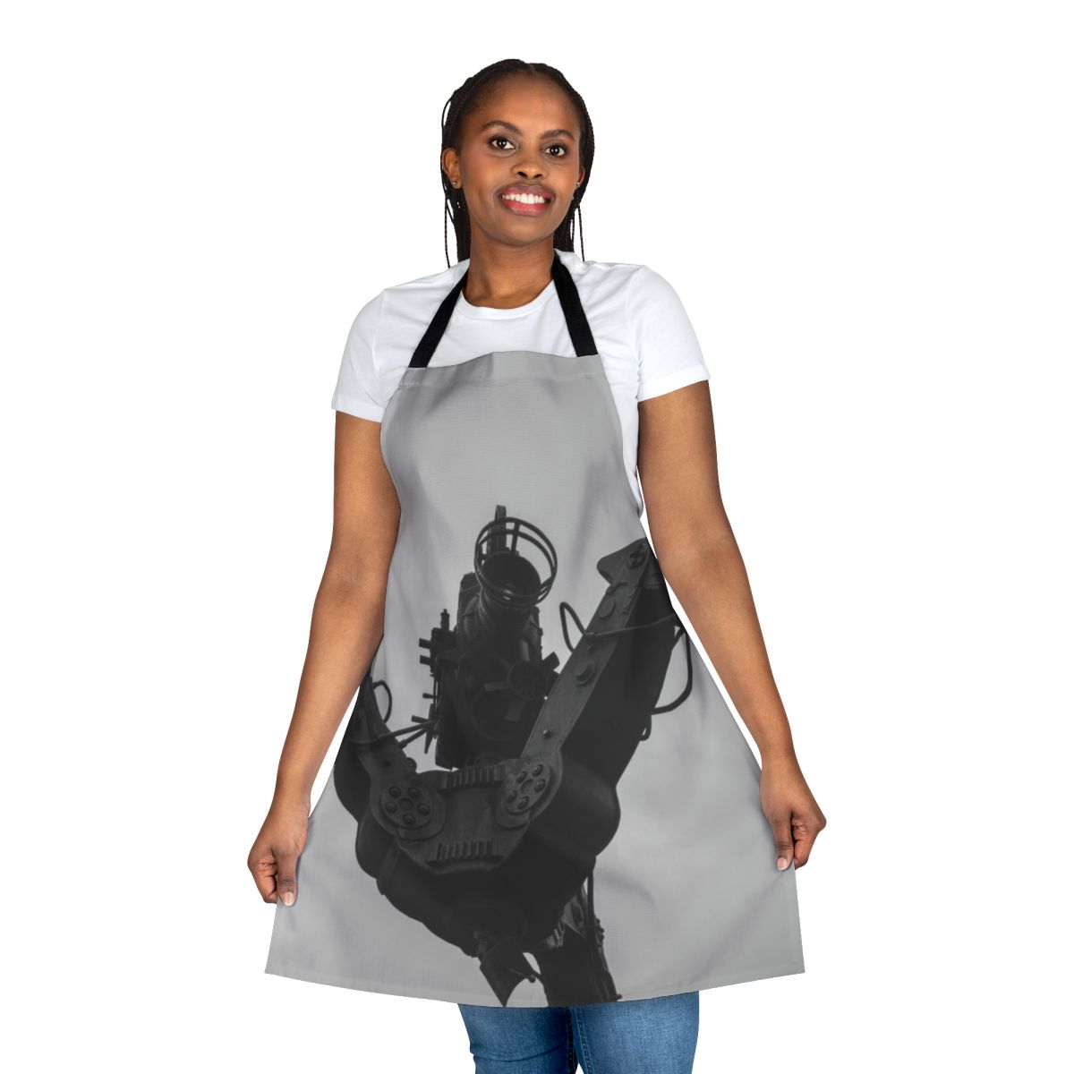 Model wearing a black apron with pockets for holding a movie camera and film equipment
