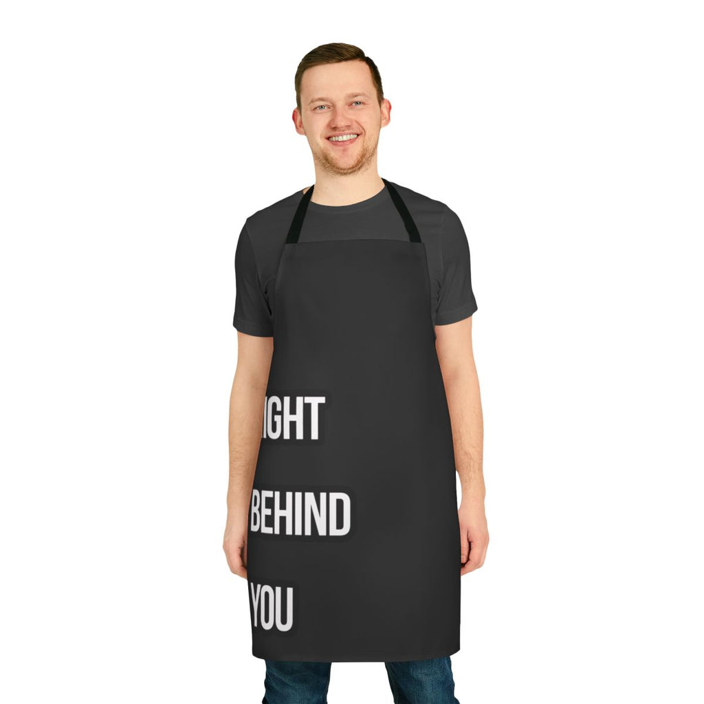 Person wearing a durable, high-quality chef apron in a restaurant kitchen