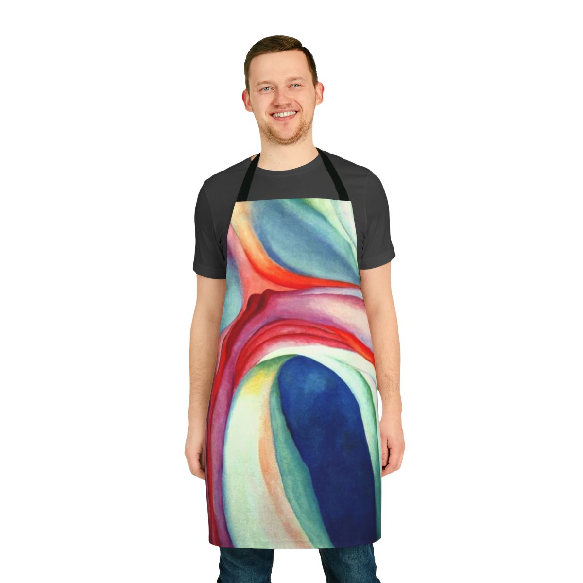 Apron featuring abstract floral painting in pink and blue colors, inspired by the artwork of Georgia O'Keeffe.