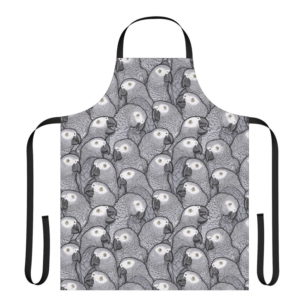 An apron featuring a vibrant pattern of african grey parrots in their natural habitat.