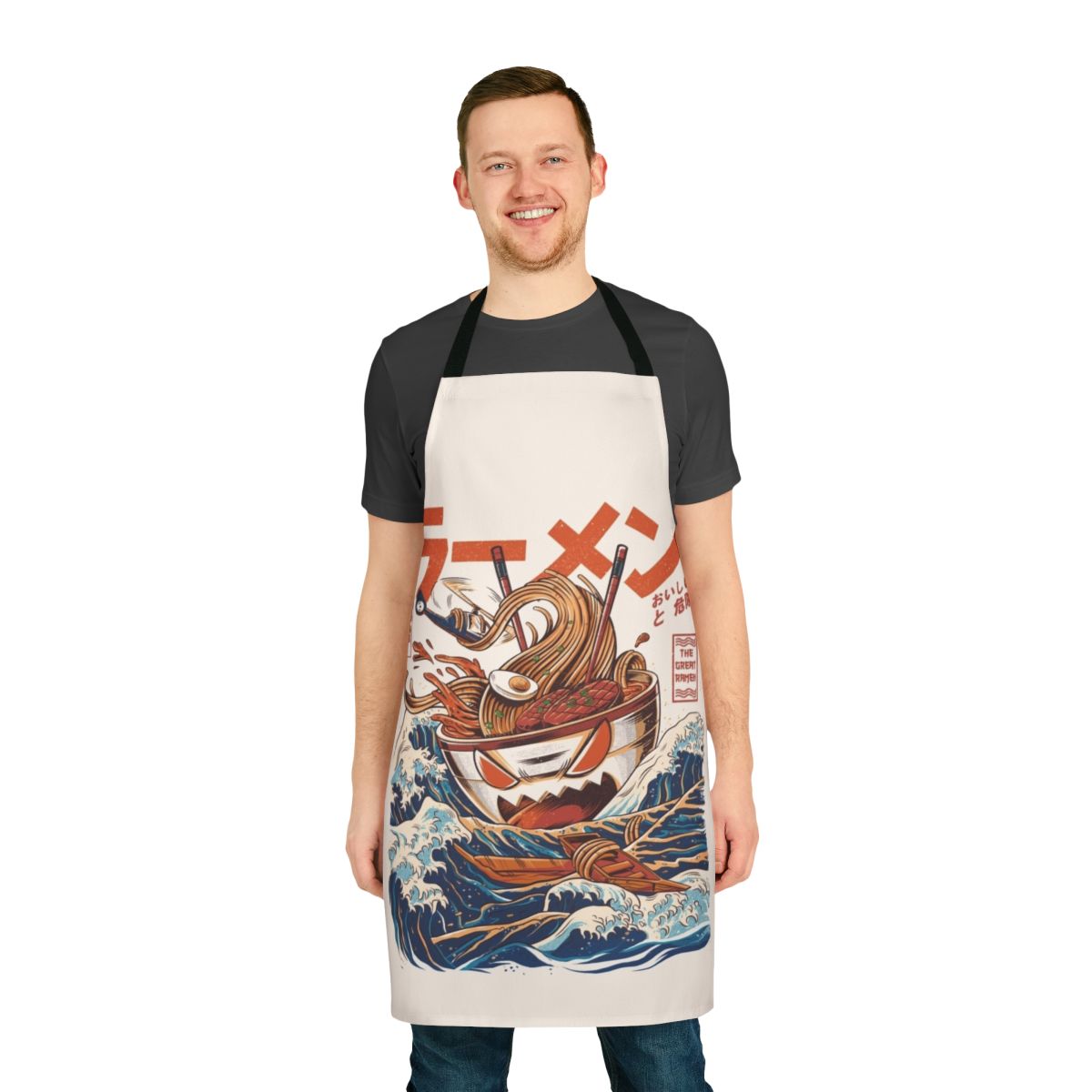 A colorful apron featuring a retro Japanese-style wave and kaiju monster design, perfect for cooking ramen and other Japanese dishes.