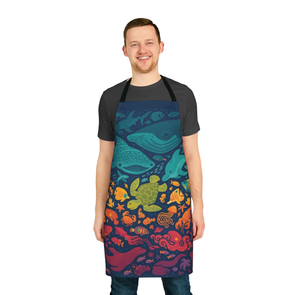 Apron featuring a vibrant, cartoon-style design of various aquatic sea creatures and marine life.