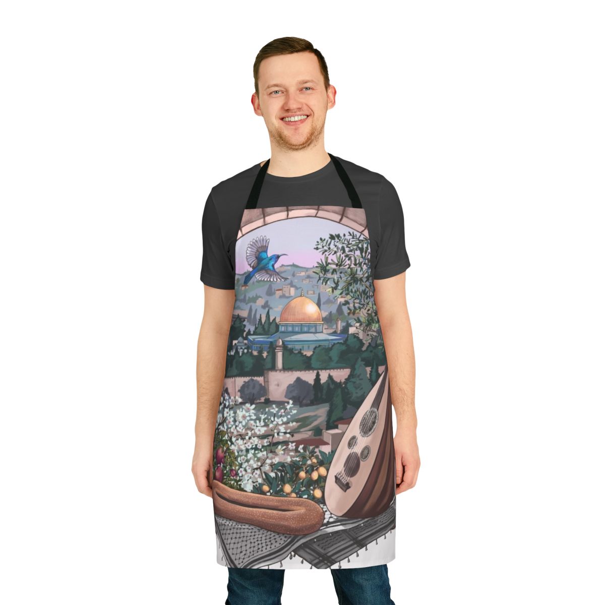 Colorful apron featuring Arabic-inspired design with olive trees, lemons, and a kuffiyeh pattern