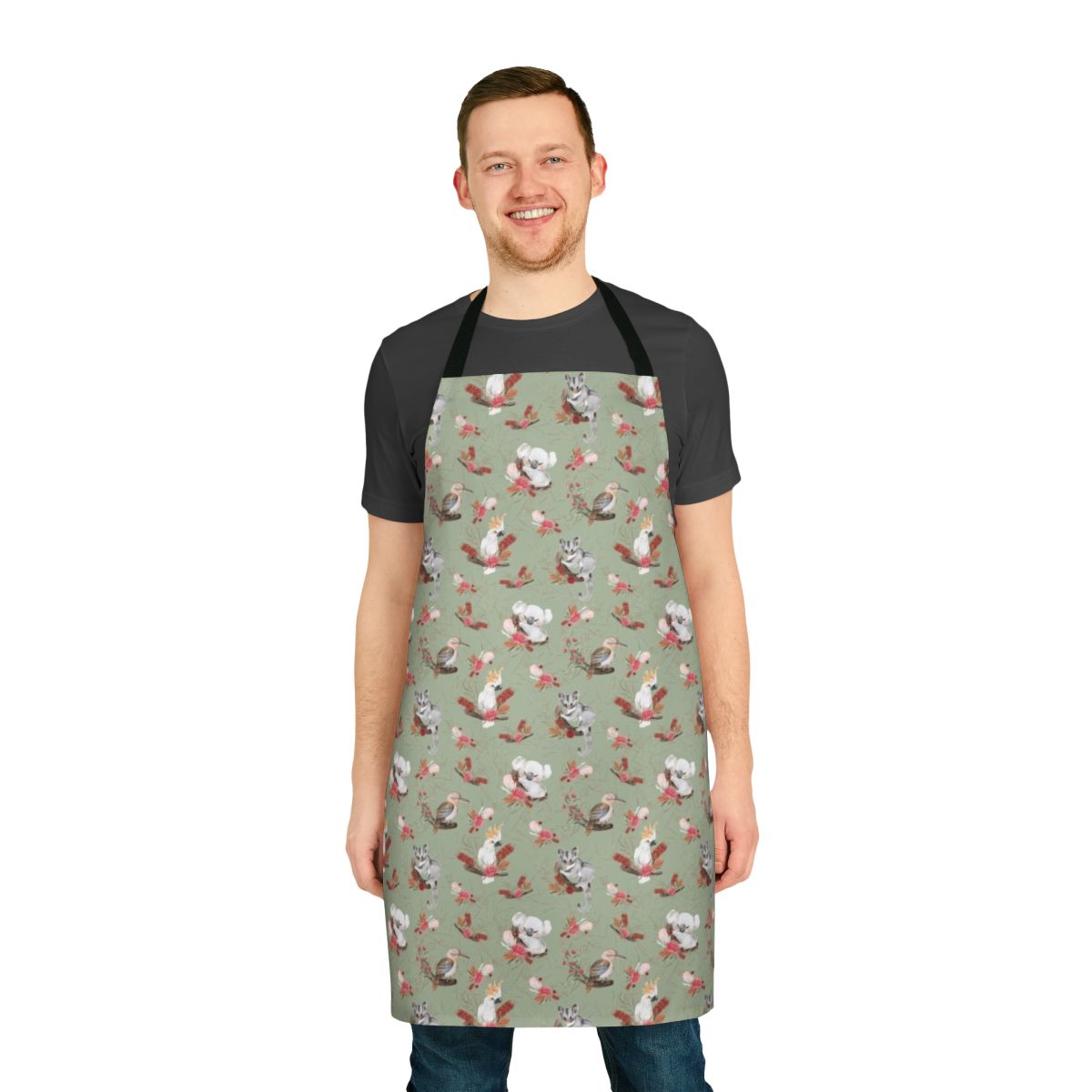 Colorful apron featuring Australian native flora and fauna including eucalyptus, kookaburra, cockatoo, and other iconic Australian wildlife and plants.