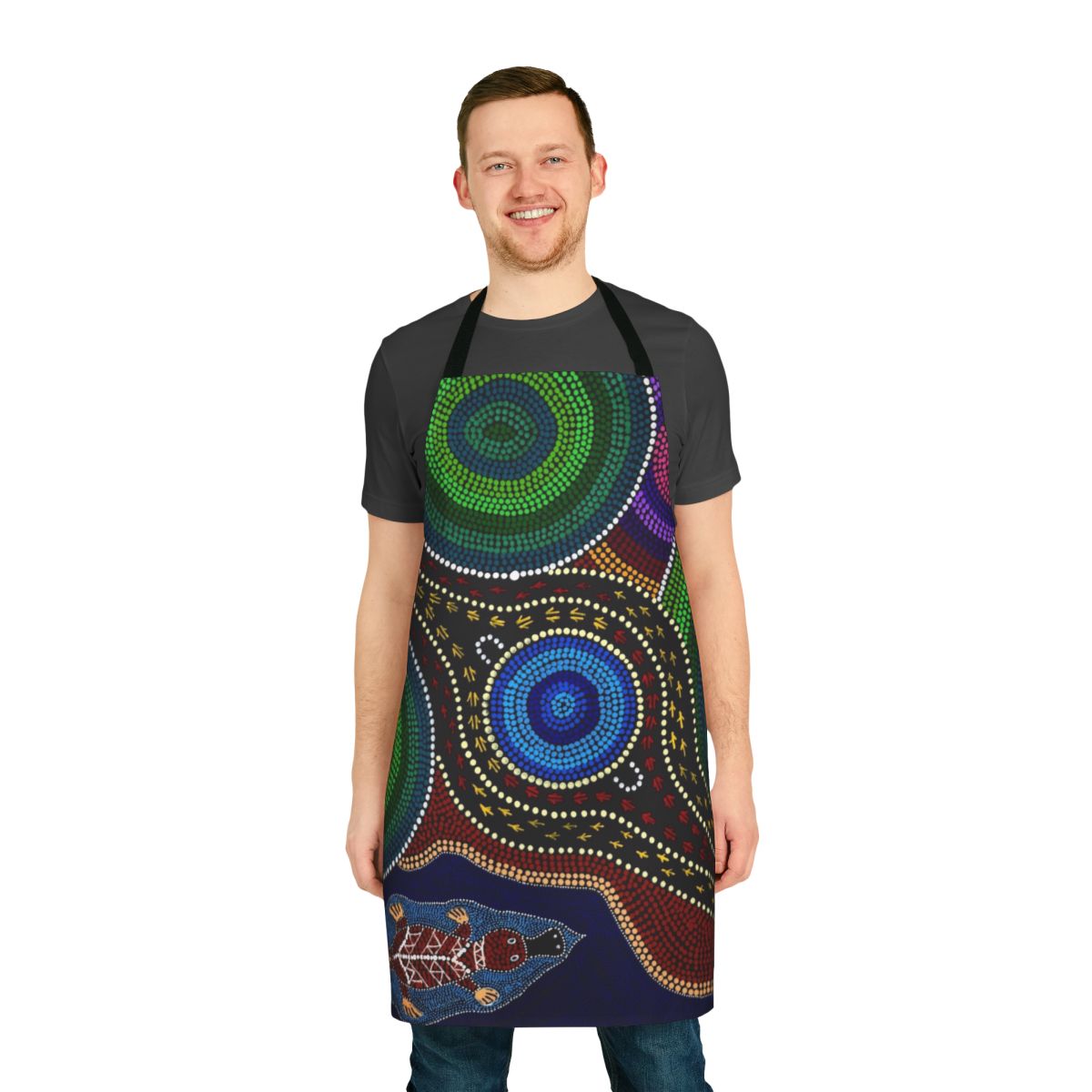 Colorful apron featuring a playful platypus design in traditional aboriginal dot painting style