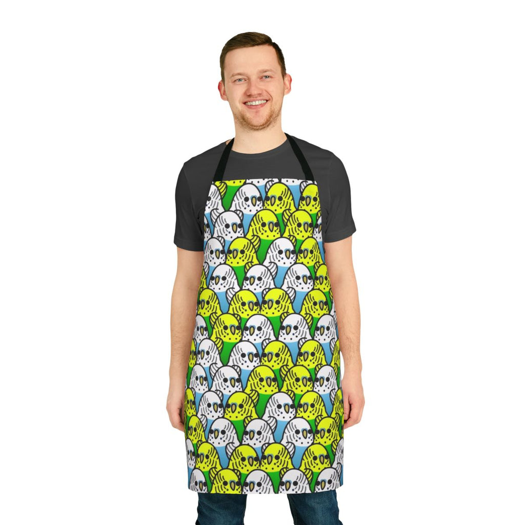 Colorful apron featuring a playful design of various species of birds including budgies, cockatiels, and macaws.