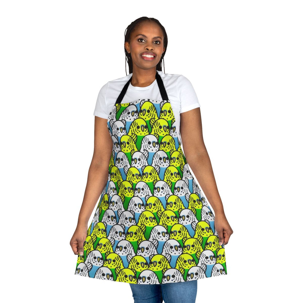 Colorful apron featuring a playful design of various species of birds including budgies, cockatiels, and macaws.
