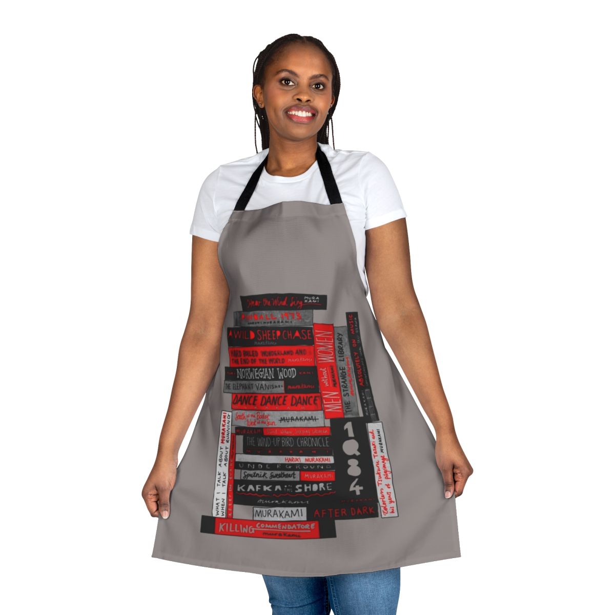 Colorful apron featuring a stack of books, representing the literary works of renowned author Haruki Murakami.