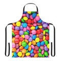 Colorful apron featuring a rainbow design and assorted candy motifs