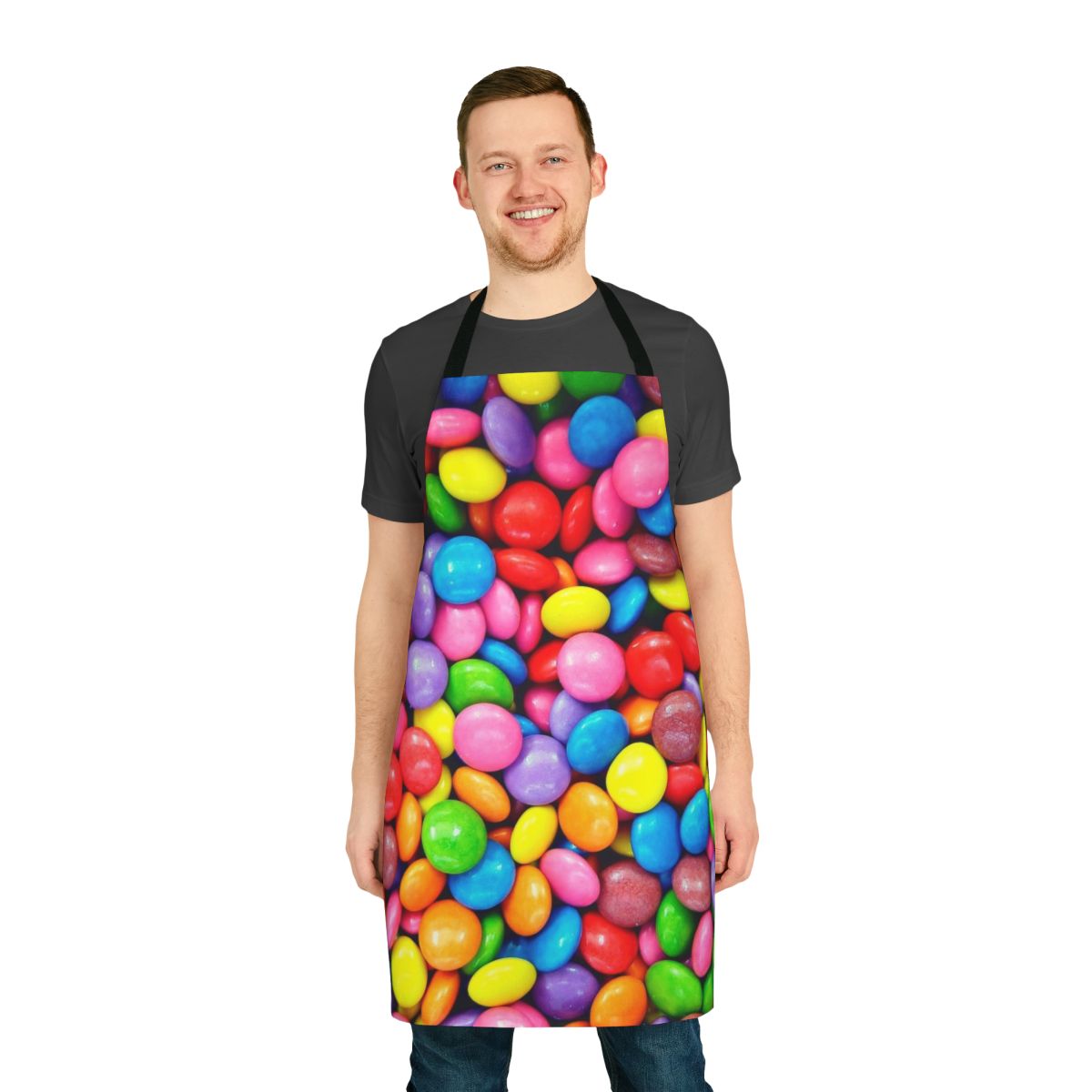 Colorful apron featuring a rainbow design and assorted candy motifs