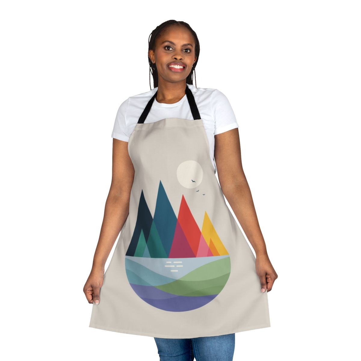A vibrant, colorful abstract design apron featuring a landscape with a rainbow, birds, and geometric shapes.