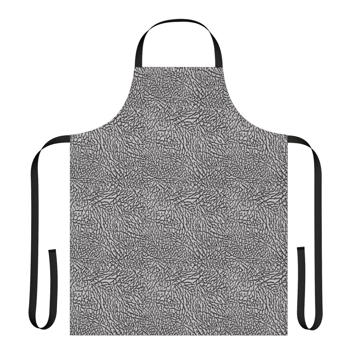 Colorful elephant-print apron hanging on a hook