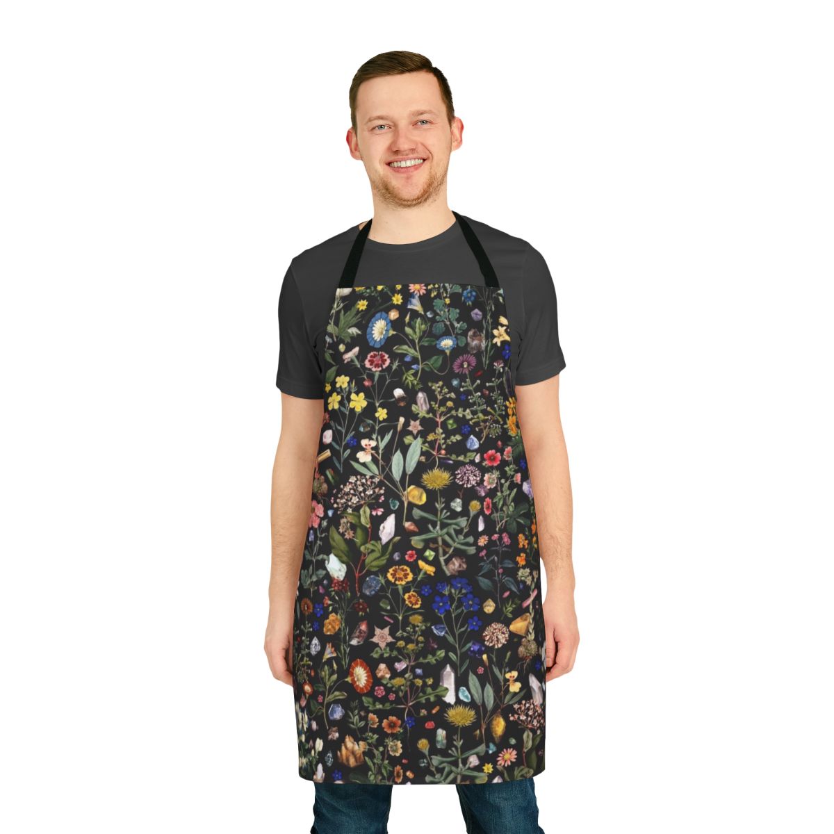 A colorful, botanical-themed apron with floral and nature-inspired patterns.