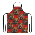 A red apron featuring a bold, stylized lion head design in the Igbo cultural tradition.