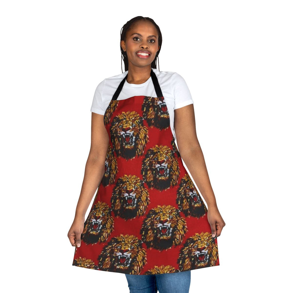 A red apron featuring a bold, stylized lion head design in the Igbo cultural tradition.