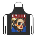 Colorful graphic apron featuring Kylie Minogue's iconic image, perfect for the kitchen or as a stylish home decor piece.