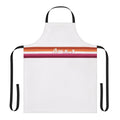 Colorful apron featuring a design of two smiling rabbits in the LGBT pride flag colors