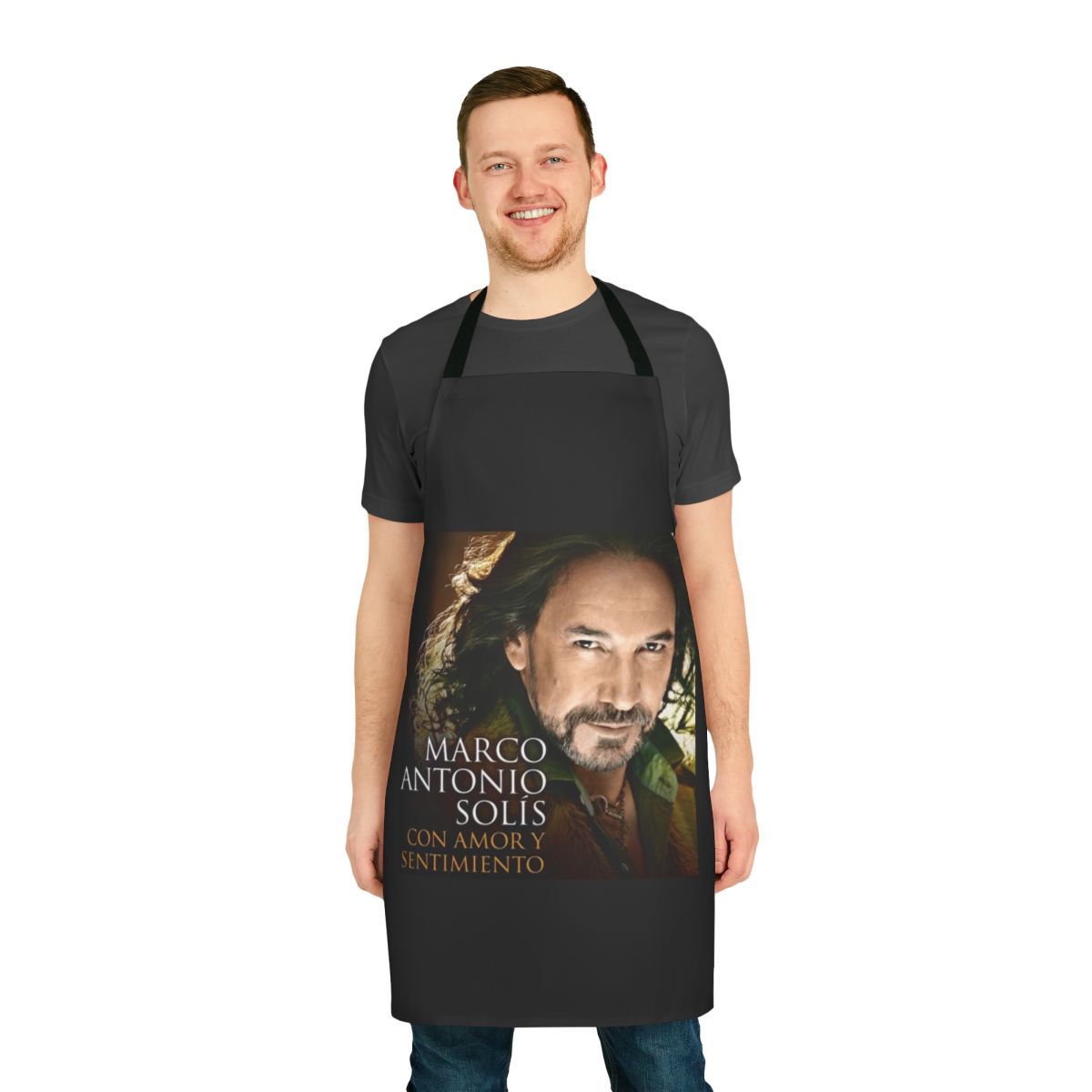 A colorful apron featuring a loteria card design and text "El Buki"