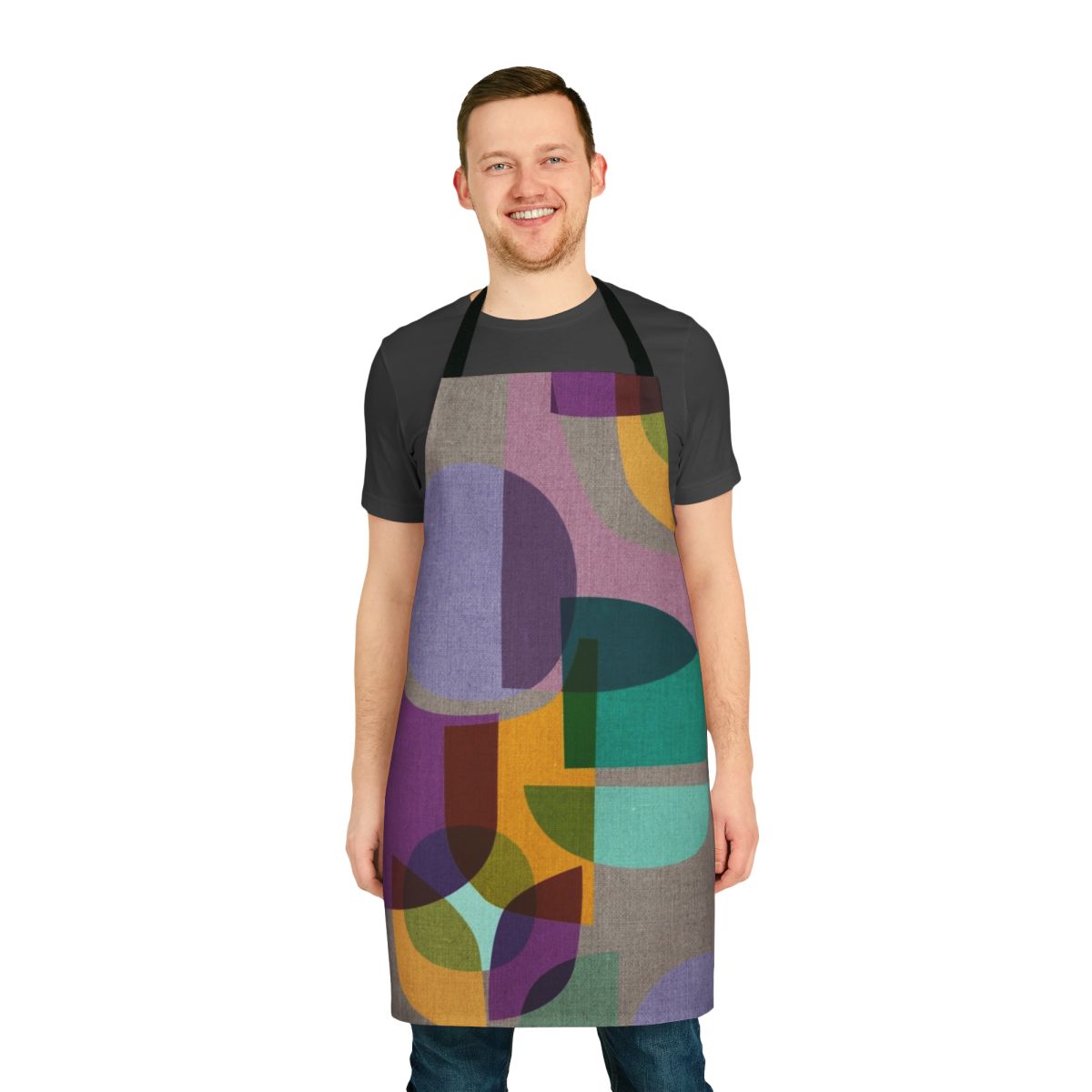 Colorful mid-century inspired apron with a kaleidoscope print design in shades of purple, lavender, and aqua.