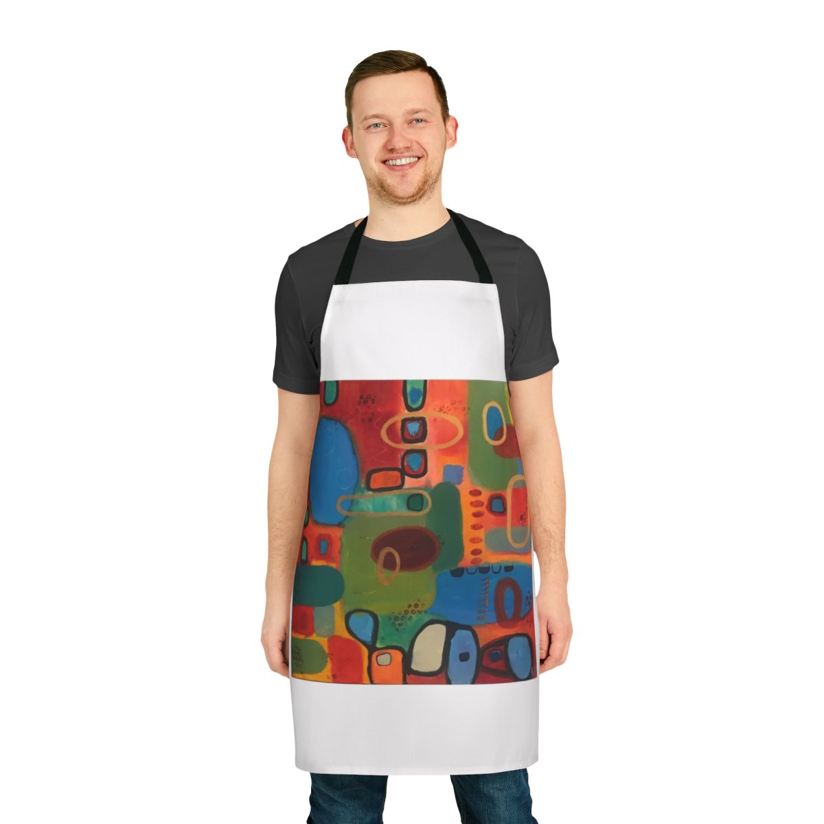Mimi mix abstract design in shades of green, blue, and shapes on a kitchen apron