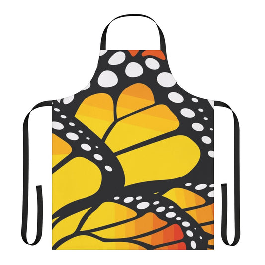 Vibrant monarch butterfly design on an orange apron with abstract and floral elements.