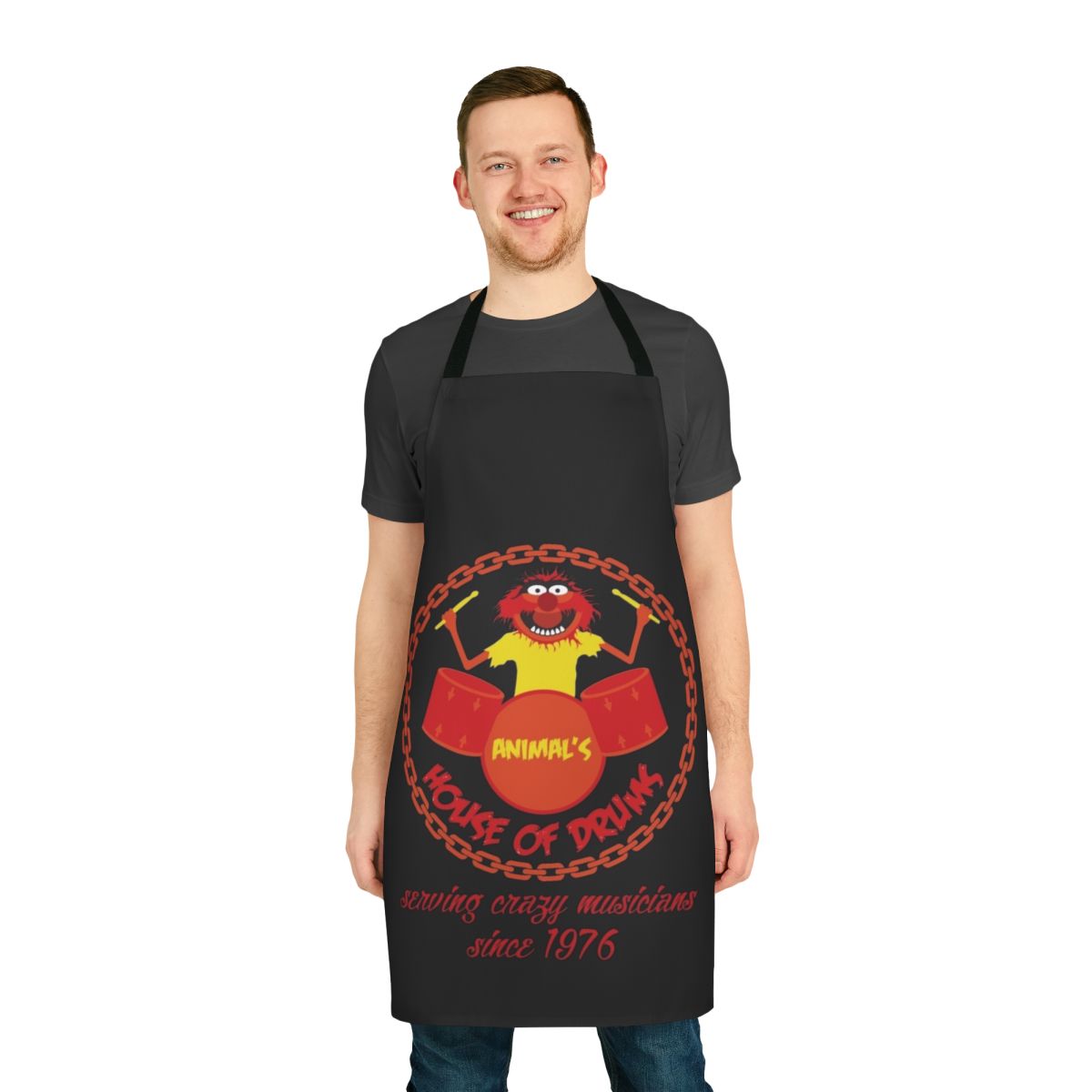 Colorful apron featuring the Muppet character Animal playing drums