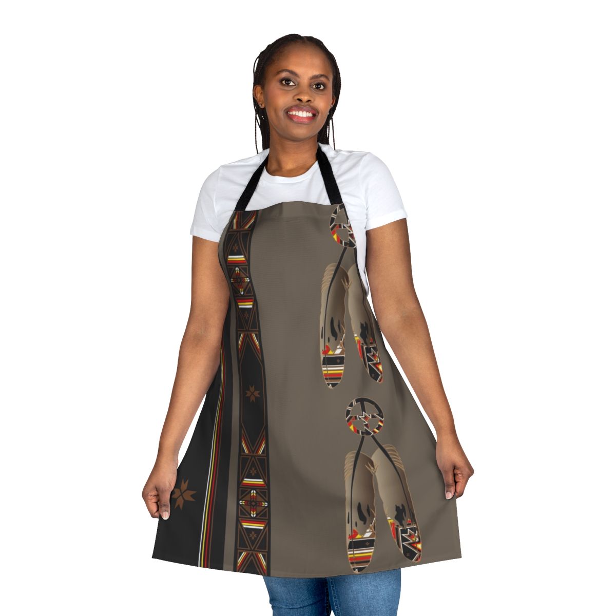 Colorful apron featuring a Melvin War Eagle-style pop art design with feathers, an eagle, and cultural symbols