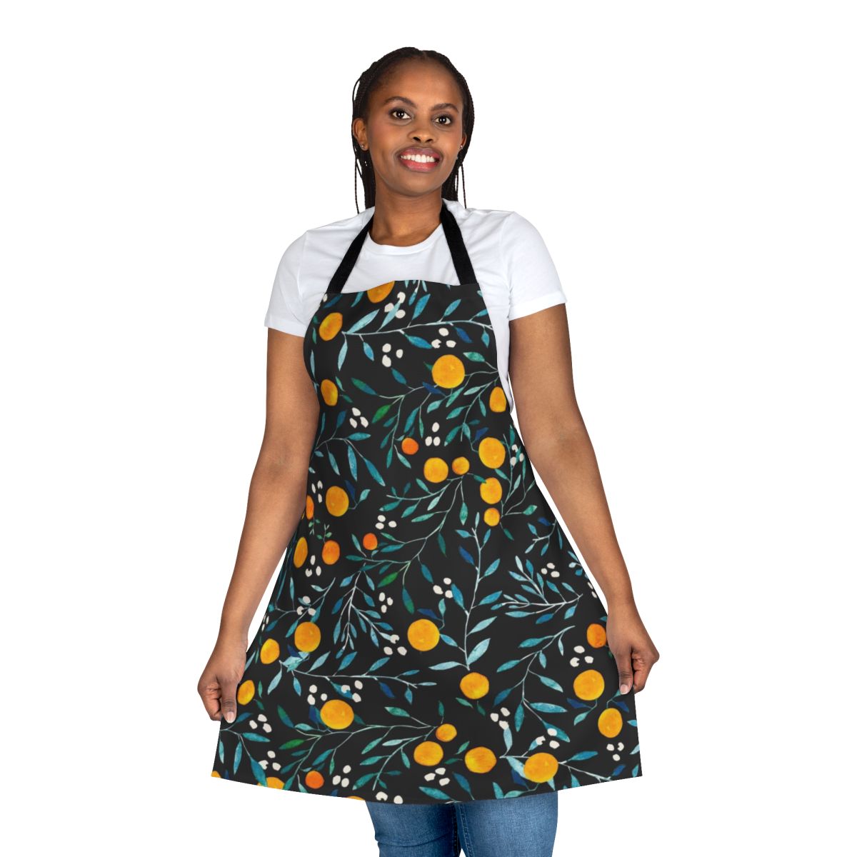 Watercolor illustration of oranges on a black background, featured on an apron.