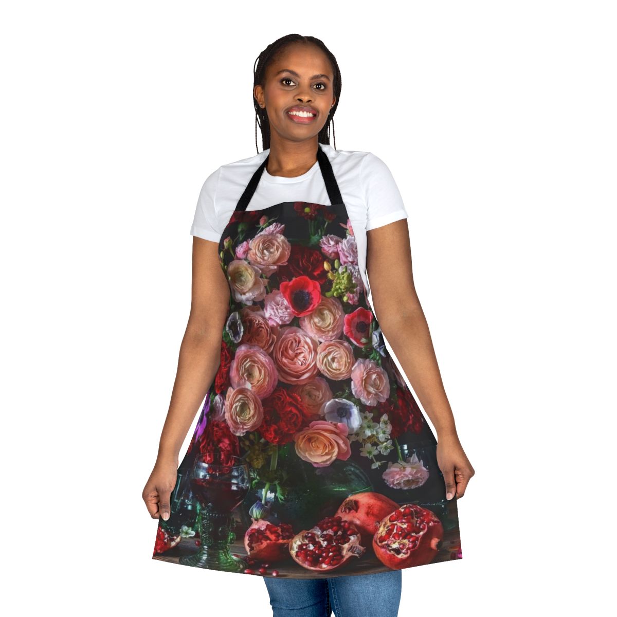 Colorful apron featuring a botanical design with pomegranates, flowers, and leaves.