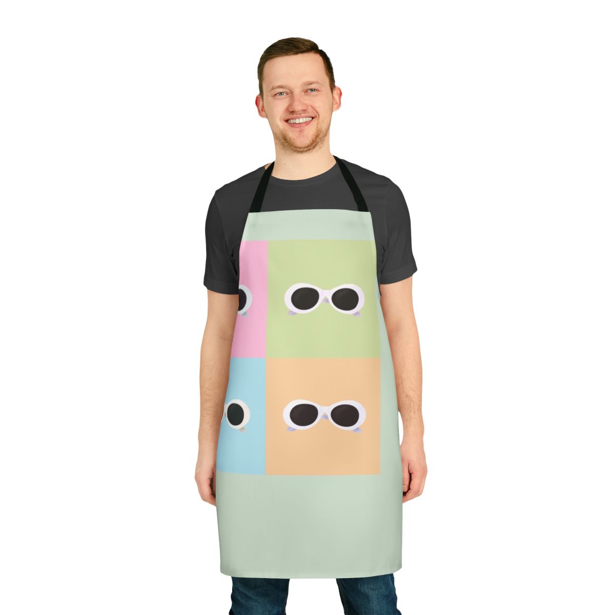 Colorful apron featuring a pop art design reminiscent of David Rose's iconic sunglasses from the TV show Schitt's Creek