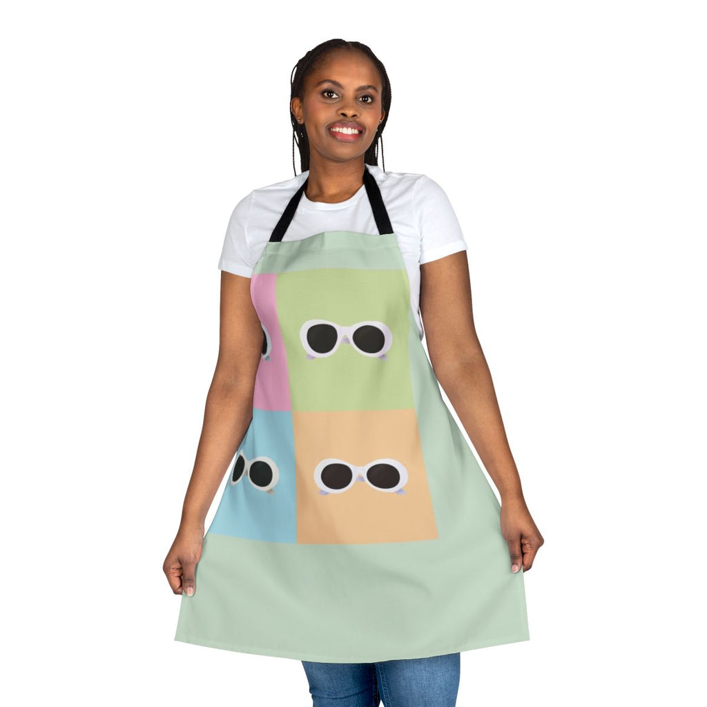 Colorful apron featuring a pop art design reminiscent of David Rose's iconic sunglasses from the TV show Schitt's Creek