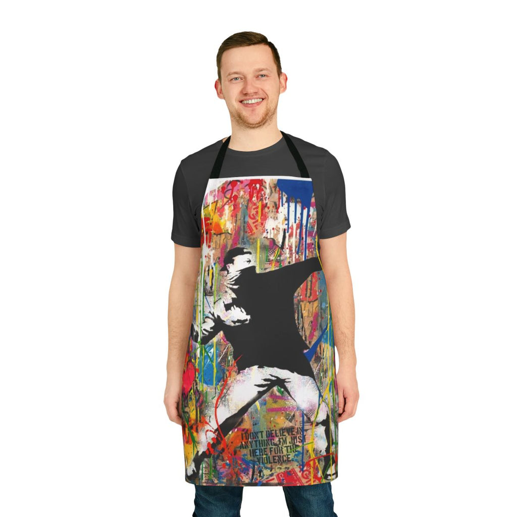 Colorful apron featuring a Banksy-inspired pop art design of a figure throwing flowers.