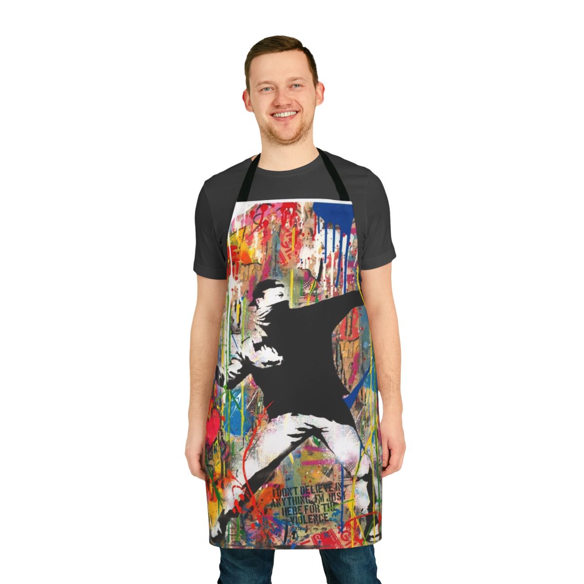 Colorful apron featuring a Banksy-inspired pop art design of a figure throwing flowers.