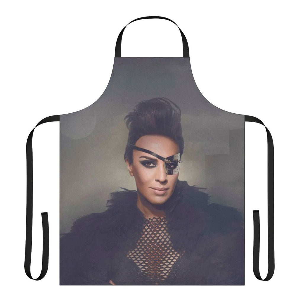 Colorful apron featuring a stylized orange tree design, inspired by the iconic pop singer Monica Naranjo.