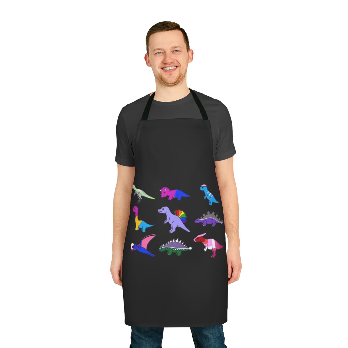 Colorful apron featuring a playful dinosaur design in pride colors