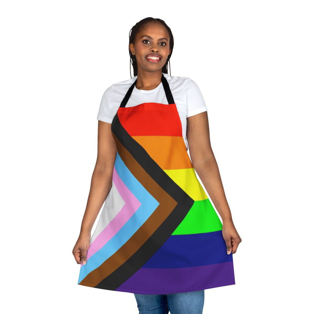 Colorful pride flag apron with inclusive, progress, and rainbow designs